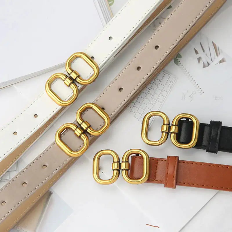 leren damesriem met goud accent details