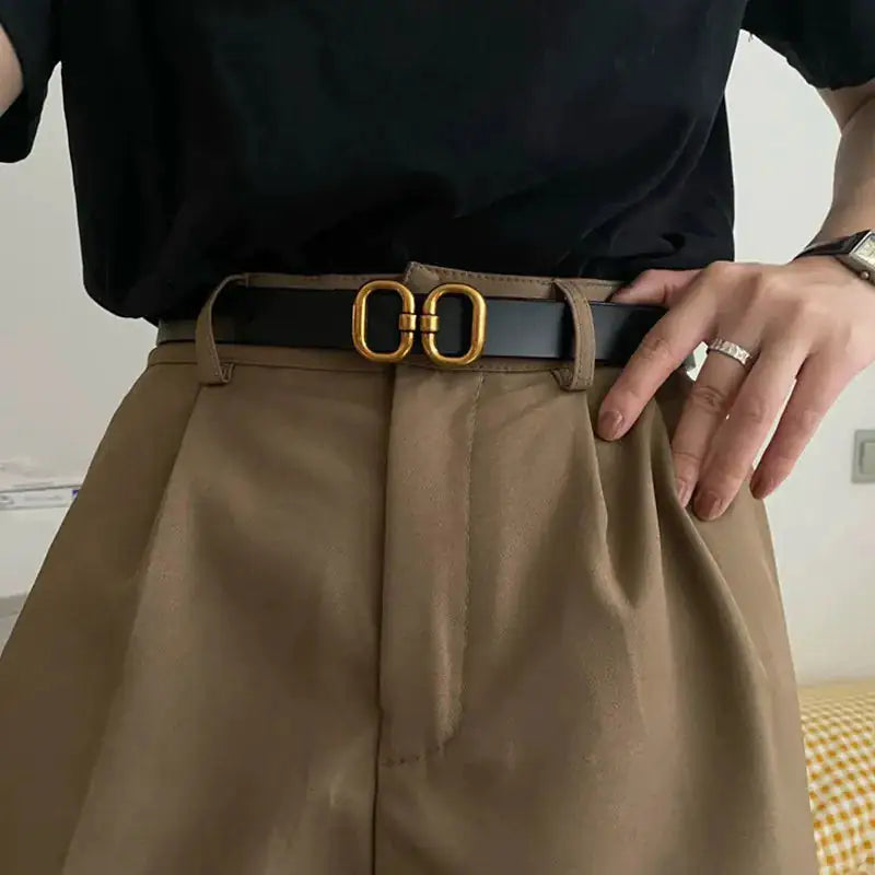 leren damesriem met goud accent